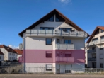 Straßenansicht Süd - Gepflegte & gut geschnittene 3-ZKB (1. OG) in toller Wohnlage von Grünstadt!
