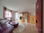 Wohnzimmer - Lichtdurchflutete Maisonette-Wohnung mit Sonnenterrasse & viel Platz für Ihre Familie!