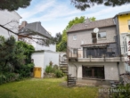 Hausansicht Garten - Familienstart in Eisenberg: DHH mit 3 Schlafzimmern, Garten und Südblick ins Grüne!