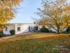 Ansicht Nord-West - Bestlage in Grünstadt: Zeitlose Villa auf einzigartigem (Traum)Grundstück mit Fernblick!
