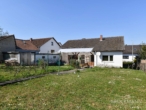 Hausansicht Garten - Freistehendes EFH in Kerzenheim mit Potenzial für eine Bebauung in zweiter Reihe!