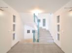 Treppenhaus - Stadtleben mit Ausblick: Extravagante Maisonettewohnung mit Dachterrasse & zwei Stellplätzen
