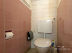 Gäste-WC (EG) - Gemütliche 3-ZKB-Maisonette-Wohnung mit idyllischem Innenhof im Pfälzerdorf Obersülzen