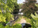 großzügiger Garten - Freiraum genießen: Bungalow mit großzügigem Garten, Koiteich & Doppelgarage
