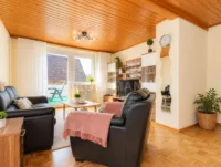 Wohnzimmer mit Terrassenzugang (EG)