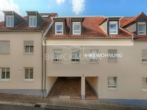 Straßenansicht - Stadtnahe Ruhe: Luftige 3-Zimmer-Maisonette mit Blick zum Haardtrand